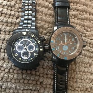 Two big invicta watches
